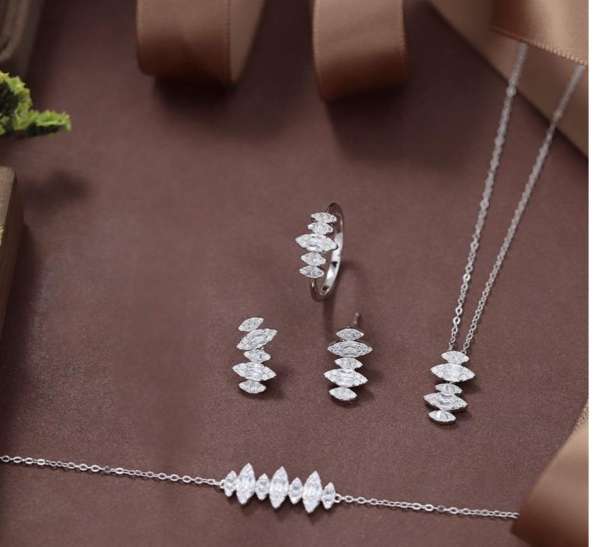 Delicate 925 Sterling Silver Full Set features shimmering Simulated Diamonds