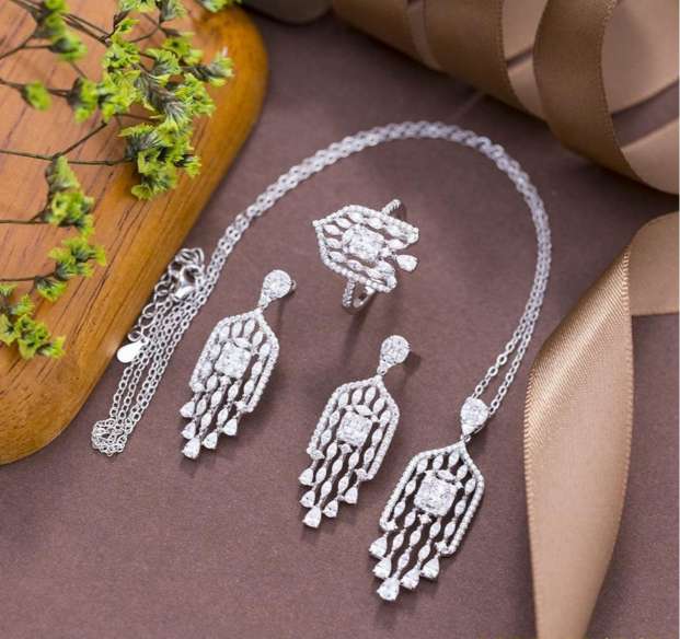 Timelessly elegant, this 925 Sterling Silver Jewelry Set sparkles with Simulated Diamonds