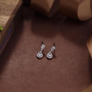 Beautifully Crafted 925 Sterling Silver Earring Studs, Adorned with Radiant Cubic Zirconia Details.