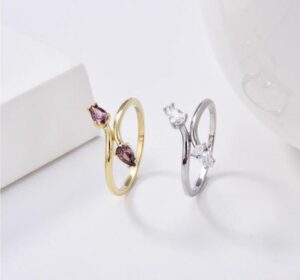 925 Sterling Silver Ring is adorned with radiant Cubic Zircons,